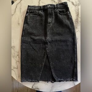 Black Jean wash  pencil skirt S-28/6 . Like new. wore once . Slit in front